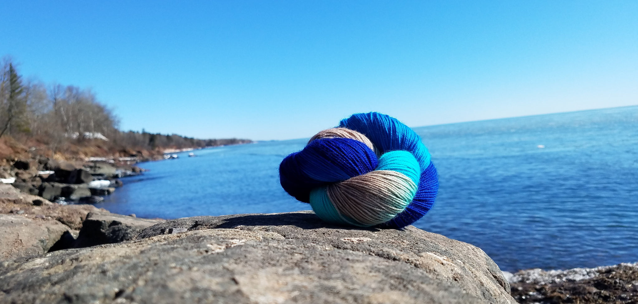lake superior Park Point yarn on rock